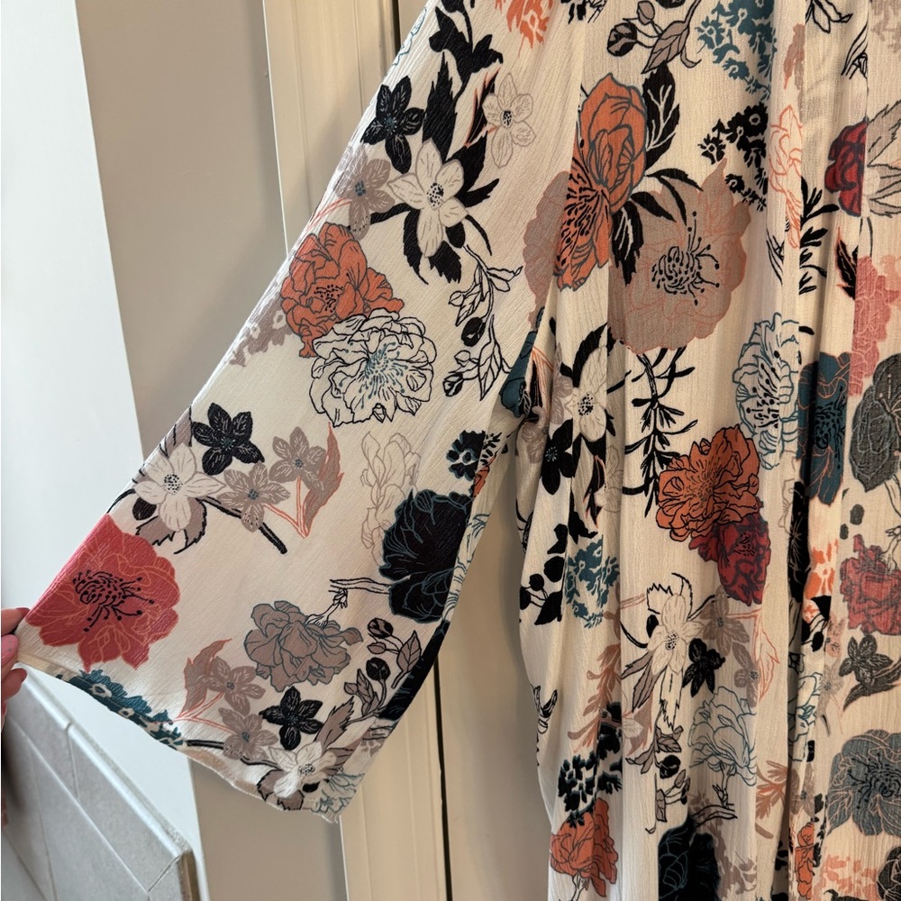 Pink Clover Floral Open Cardigan in White with Black, Coral, Blue Accents - Picture 2 of 3